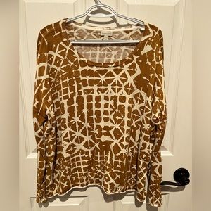 Beautiful silk and cotton top. Beautiful colors and drapes beautifully. NWOT